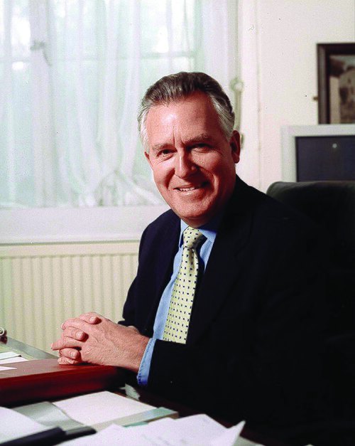 Peter Hain at his desk as a minister